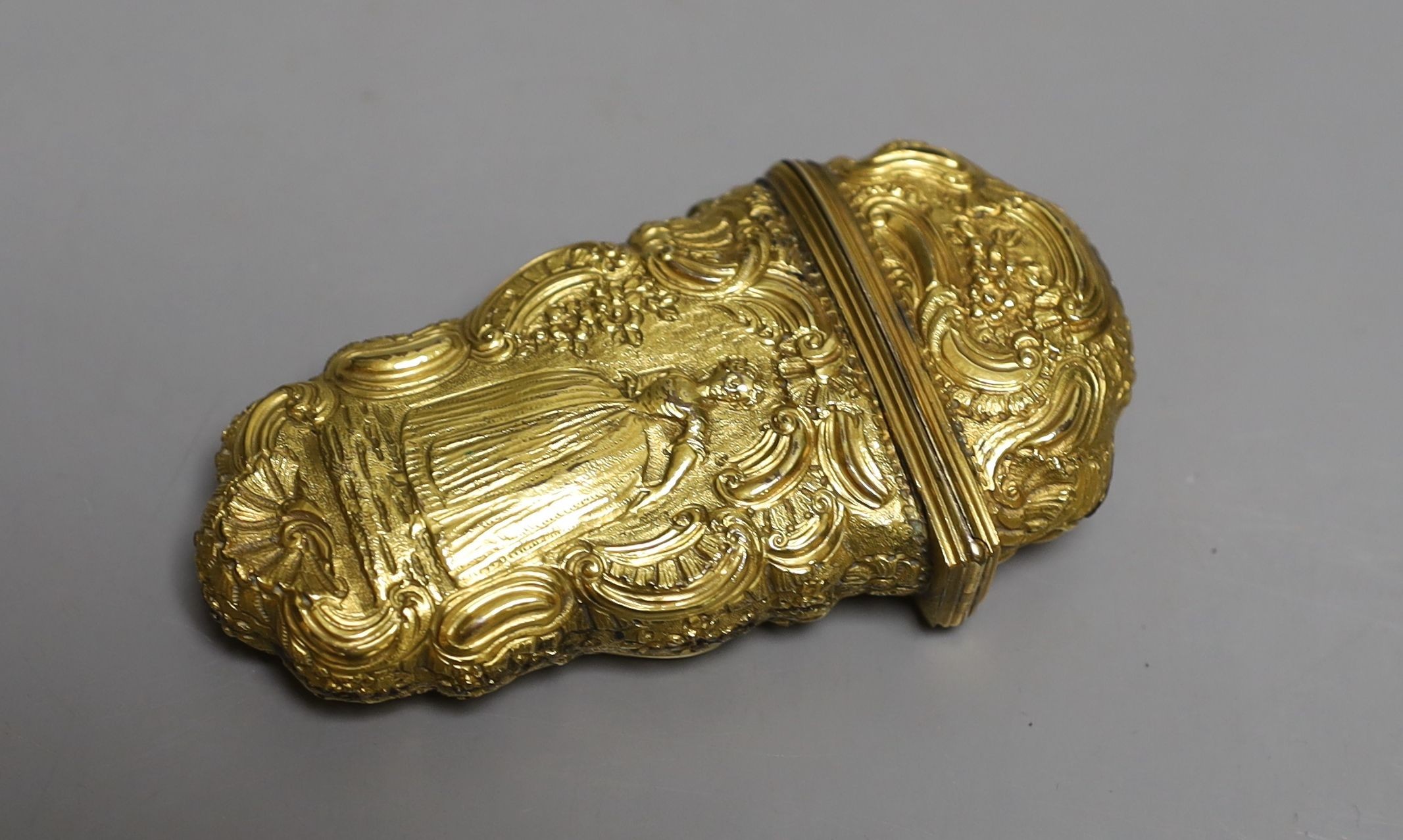 A George III gilt metal etui containing accessories, 10cms high.